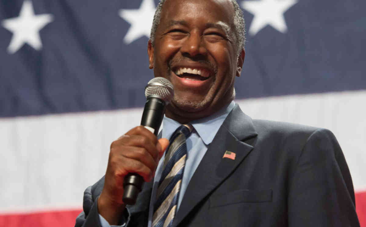 Presidential candidate Dr. Ben Carson smiles as he is cheered at a rally at the Anaheim Convention Center Arena in Anaheim, California on Wednesday, Sept. 9, 2015. (Leonard Ortiz/The Orange County Register via AP)