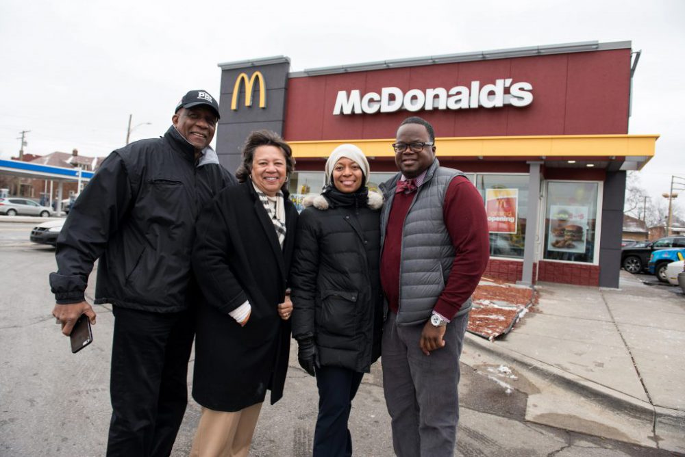 James Thrower, Jr. (far right) at the grand re-opening of his McDonald’s restaurant on Linwood in March. He is joined by his father Jim, mother Marla and sister Joni.