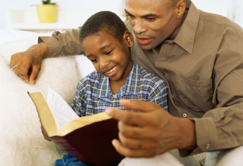 NewsBriefs_dadreadingtofather dadreadingtofather